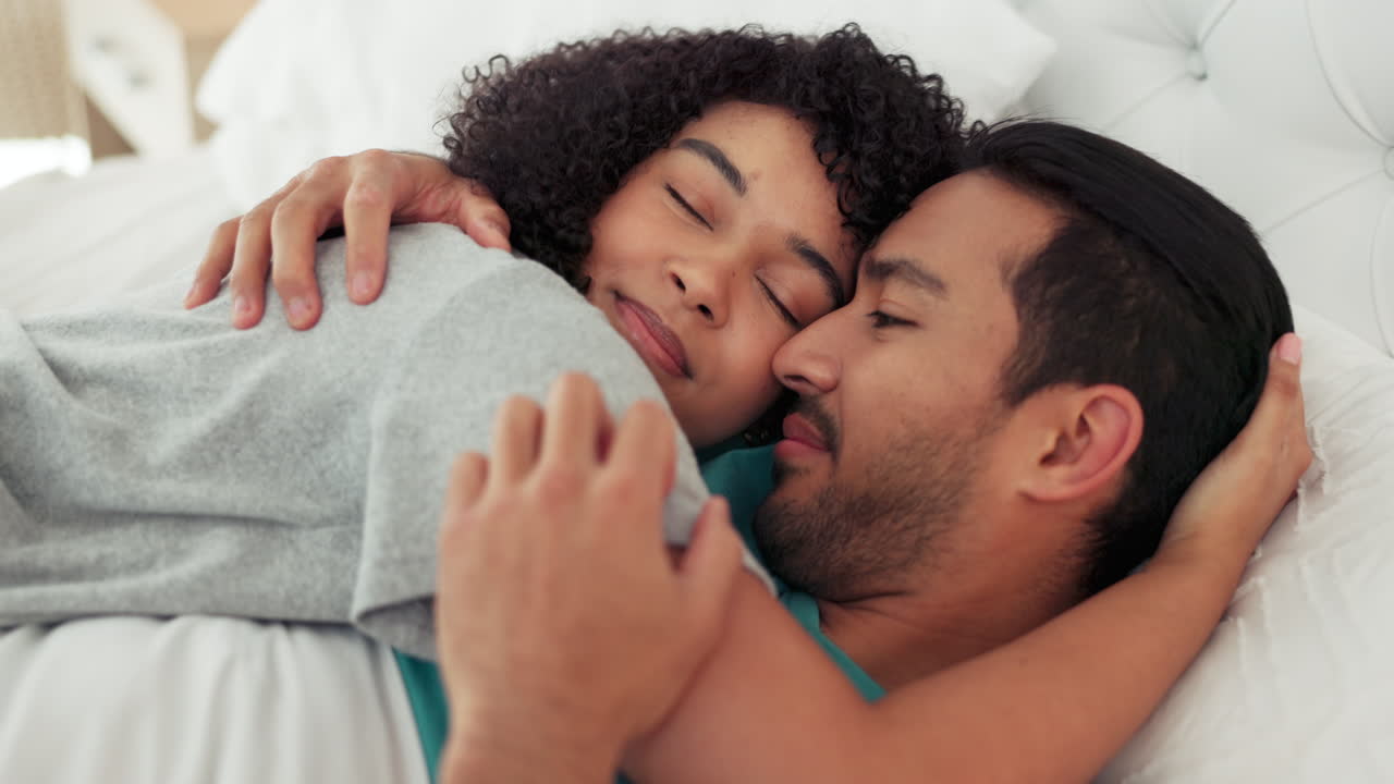 Love, bedroom and couple relax together