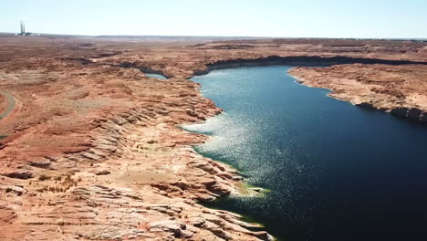 panning aerial panorama of landscape surrounding lake powell in usa