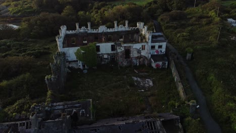 soldiers point house aerial view establishing abandoned empty holyhead victorian estate at sunset