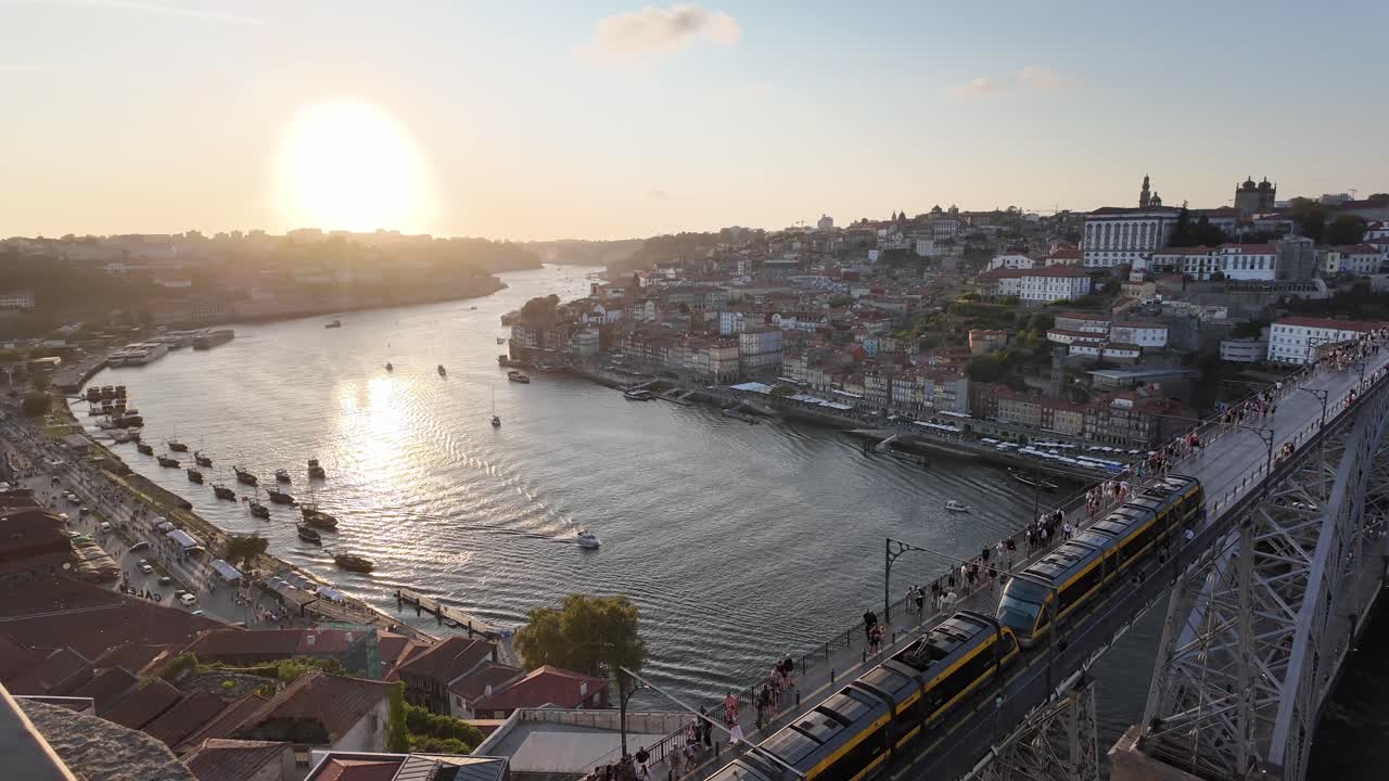 Aerial View of Porto, Portugal at Sunset with Tram on Dom Luís I Bridge