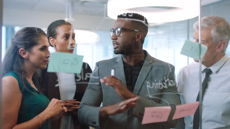 Teamwork, post-it-lapper eller forretningsmøde