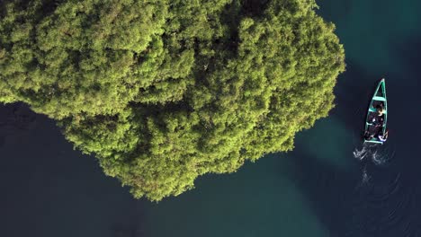 AERIAL:-Lago-De-Camecuaro,-Boat,-Tangancicuaro,-Mexico