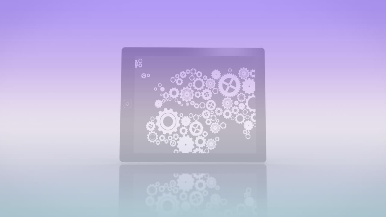 engranajes y engranajes que giran sobre la tableta en un fondo de pendiente