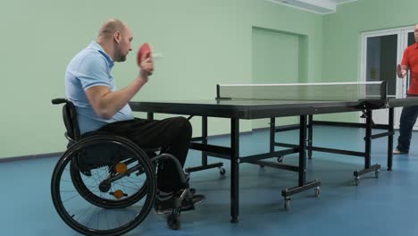 person with a disability playing table tennis