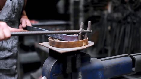 blacksmith shaping the molten metal 4k