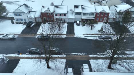 Snowfall-on-frosty-winter-day-in-american-housing-area