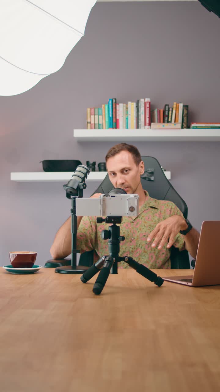 Man Recording a Video at Home