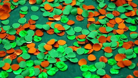 scattering of green and red confetti, festive background