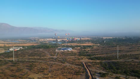 caren lagoon and hot air balloons chile