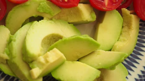 sliced avocado and tomatoes
