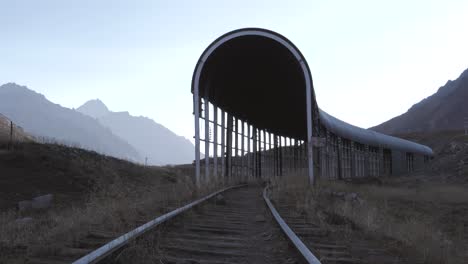 an abandoned rail in south america. close to the aconcagua. dark place
