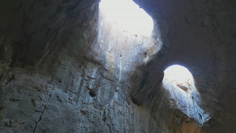 mysterious cave with skylights