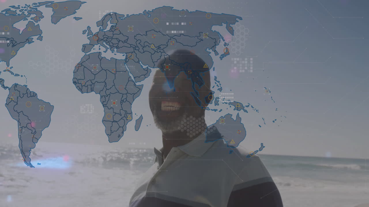 At beach, man smiling with animation of world map and data processing