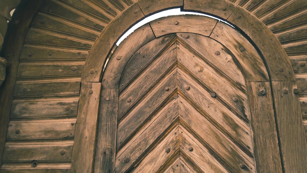 Old vintage wooden door. Vintage background close-up.