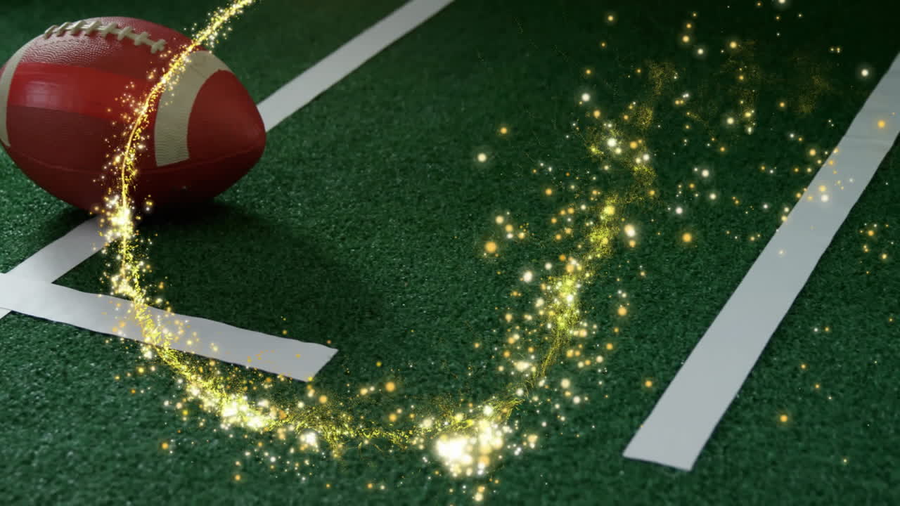 Animation of glowing sparkles moving across football field on turf
