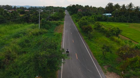 country road with motorbike and scenic landscape