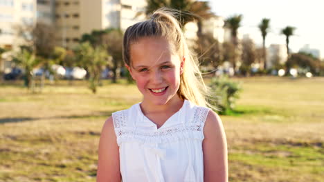 Face,-girl-and-child-at-park-in-wind