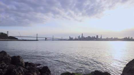 Bay-Bridge,-cityscape-and-the-shore