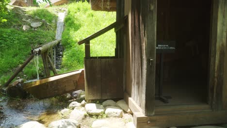 traditional water mill building in shirakawago