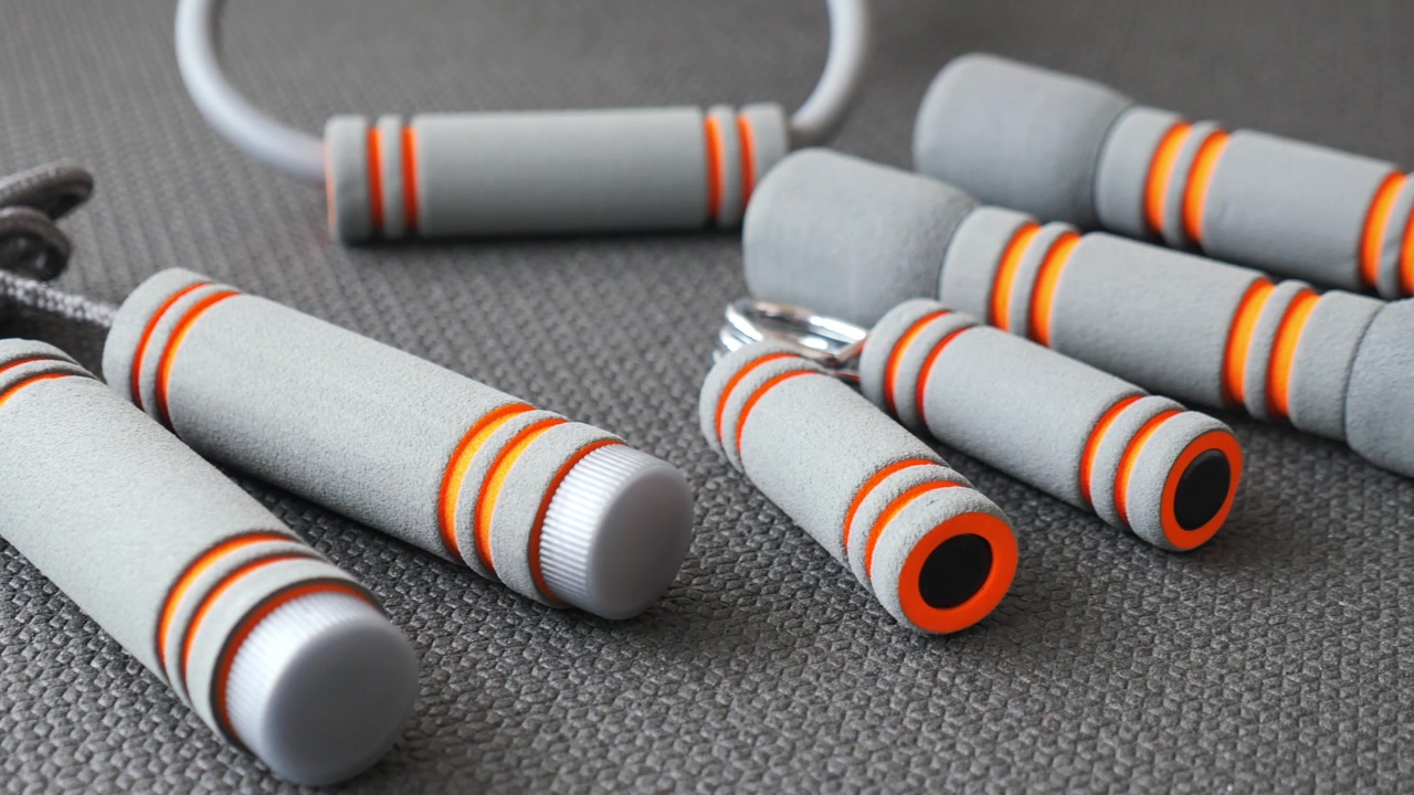 Close-up of Grey and Orange Fitness Equipment Handles