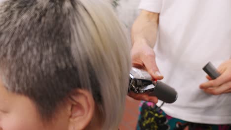 Buzz cut being done