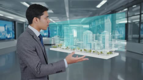 businessman interacting with holographic city projection