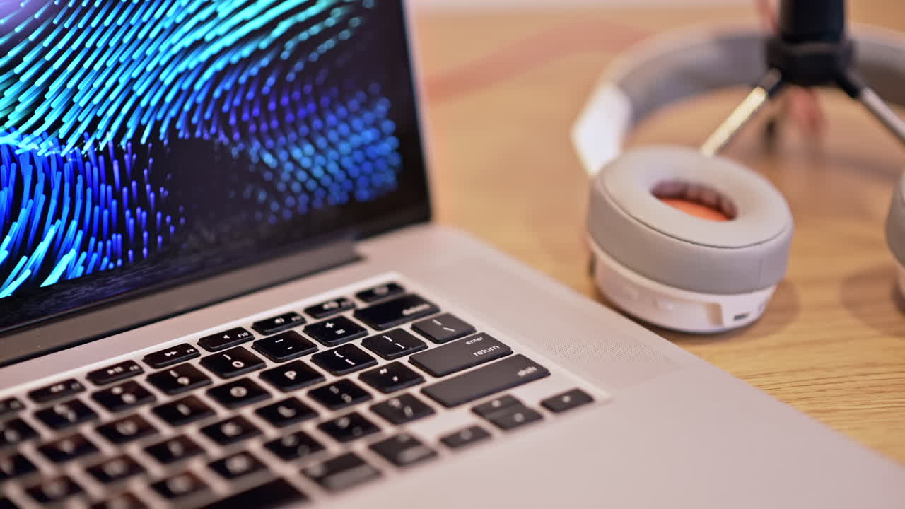 Laptop, headphones and microphone on wooden table. Content creator tools