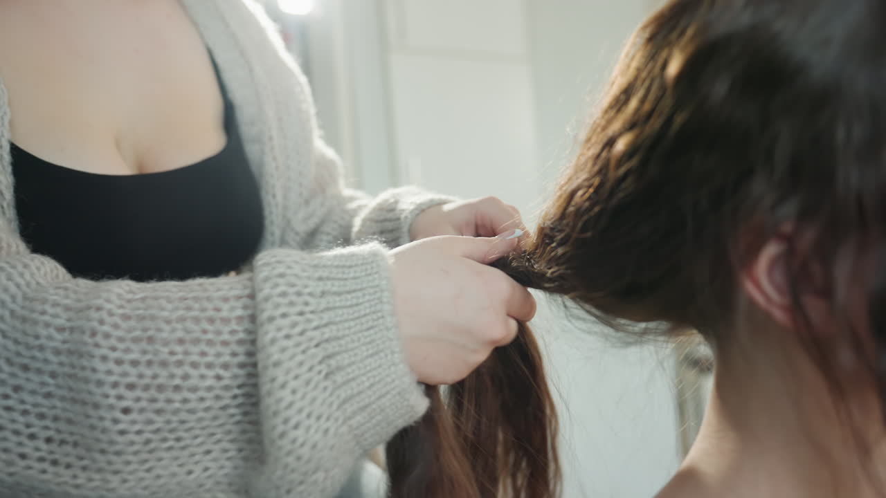 Caucasian Therapist Braiding Long Hair For Relaxation Wellness Session In Soft Light, Gentle Hands, Mindful Rhythm, Soothing Movement, Domestic Studio Vibe, Calming Breathing And Tactile Comfort