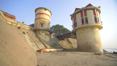 shot revealing water towers by the ganges