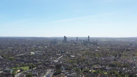 dolly-forward-drone-shot-of-Croydon-suburban-London-on-a-sunny-day