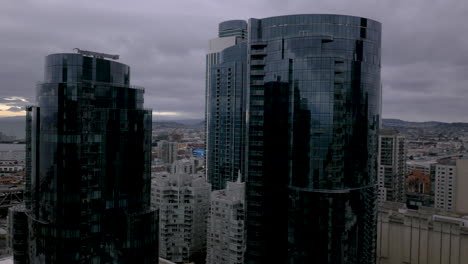 modern skyscrapers in an urban cityscape on a cloudy day