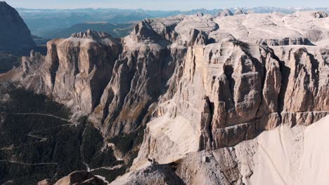 aerial view of mountain peaks during sunrise in the dolomites, italy