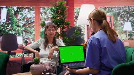 senior woman with disability asking nurse for advice and medicine