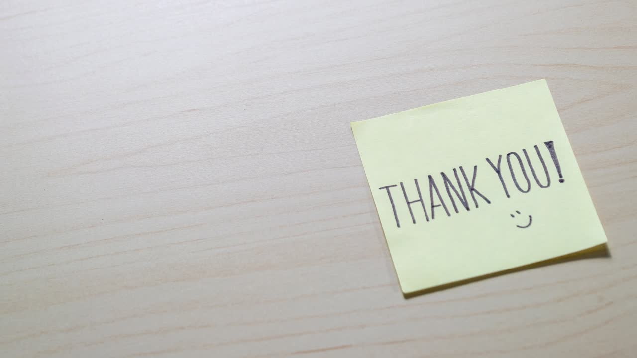 A close-up of aThank Younote set against a clean surface radiating appreciation.