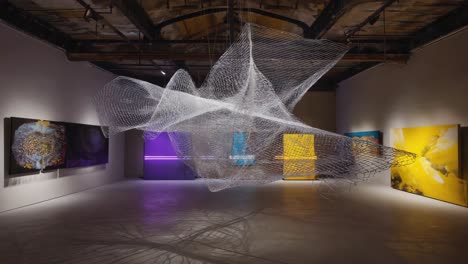 art gallery with modern sculptures and paintings