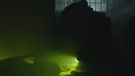 military operation in abandoned building at night