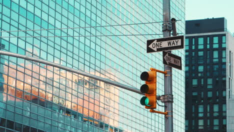 Close-Up-Of-Traffic-Lights-Above-Road-Junction-In-New-York