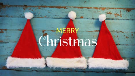 merry christmas text and santa hats