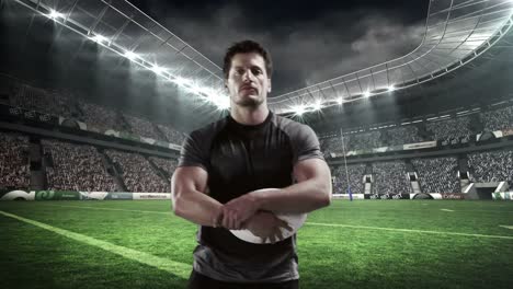 serieuze rugbyspeler met een rugbybal