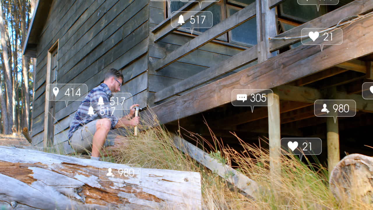 man kneeling hammering cabin plank beside forest, with animated construction icons showing repair