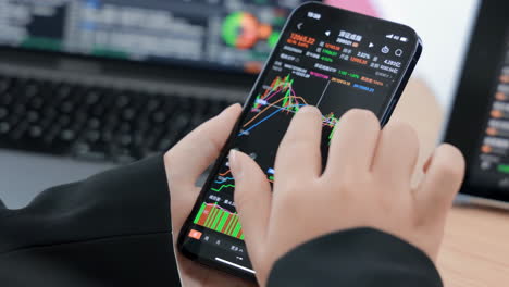 crypto trader investor broker executing financial stock trade market trading order to buy or sell cryptocurrency by using cell phone smartphone app