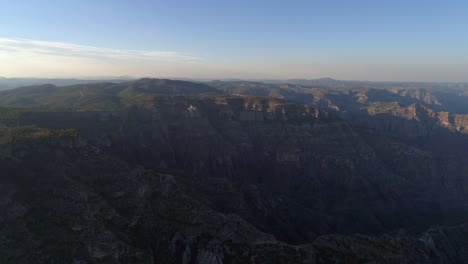 Aerial-shot-of-the-epic-Urique-Canyon-at-sunset-in-Divisadero,-Copper-Canyon-Region,-Chihuahua