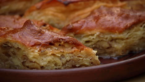 close up view of homemade baklava on plate