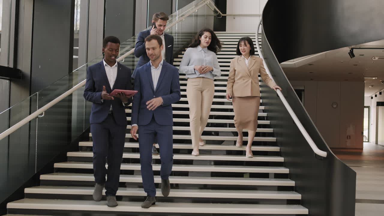 Diverse Businesspeople Going Downstairs