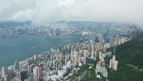 beautiful drone view of hong kong, central and victoria habour in hong kong with nice weather