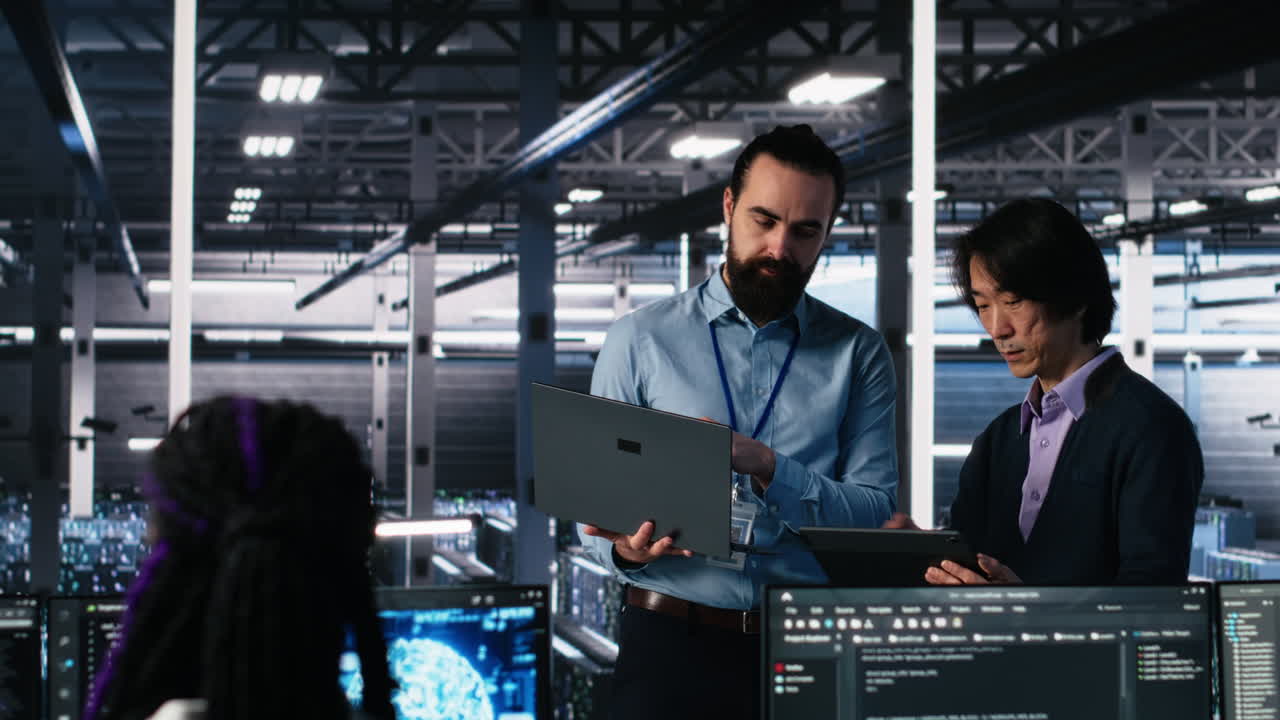 Data Center Manager Supervising Work Done By Programmers On Neural Network