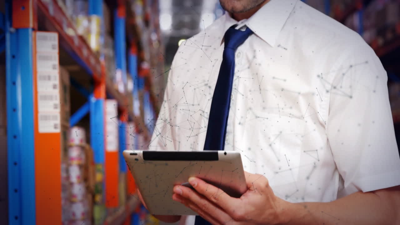 Warehouse worker using tablet with green data processing animation overlay
