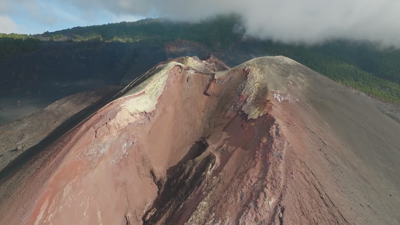Overhead drone shot closing on a crater revealing nature's silent force
