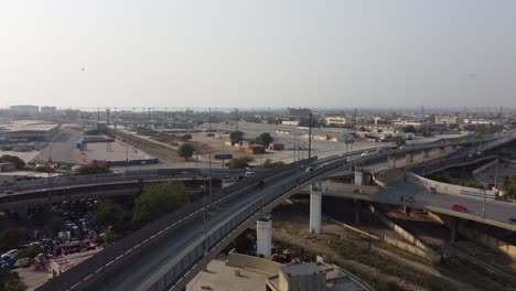 Aerial-View-Of-Jinnah-Flyover-Over-Rotary-Food-Park-In-Karachi