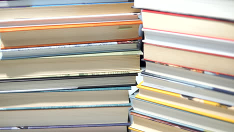 closeup with pile of colorful hardcover books